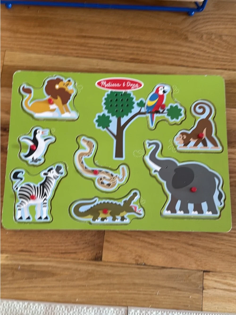 Melissa & Doug Blue Wire Rack with Colorful Animal Peg Puzzles